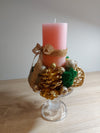 Elegant Candle Holder with Gold Decorations and Pink Candle