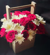 Elegant Floral Arrangement with Red Roses and White Daisies