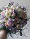 Delicate Bouquet of Pink Roses and Clematis Flowers