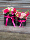 Floral Arrangement in Black Boxes with Pink Bows