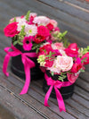 Floral Arrangement in Black Boxes with Pink Bows