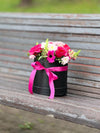 Floral Arrangement in Black Boxes with Pink Bows