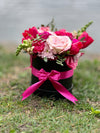Floral Arrangement in Black Boxes with Pink Bows