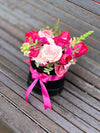 Floral Arrangement in Black Boxes with Pink Bows